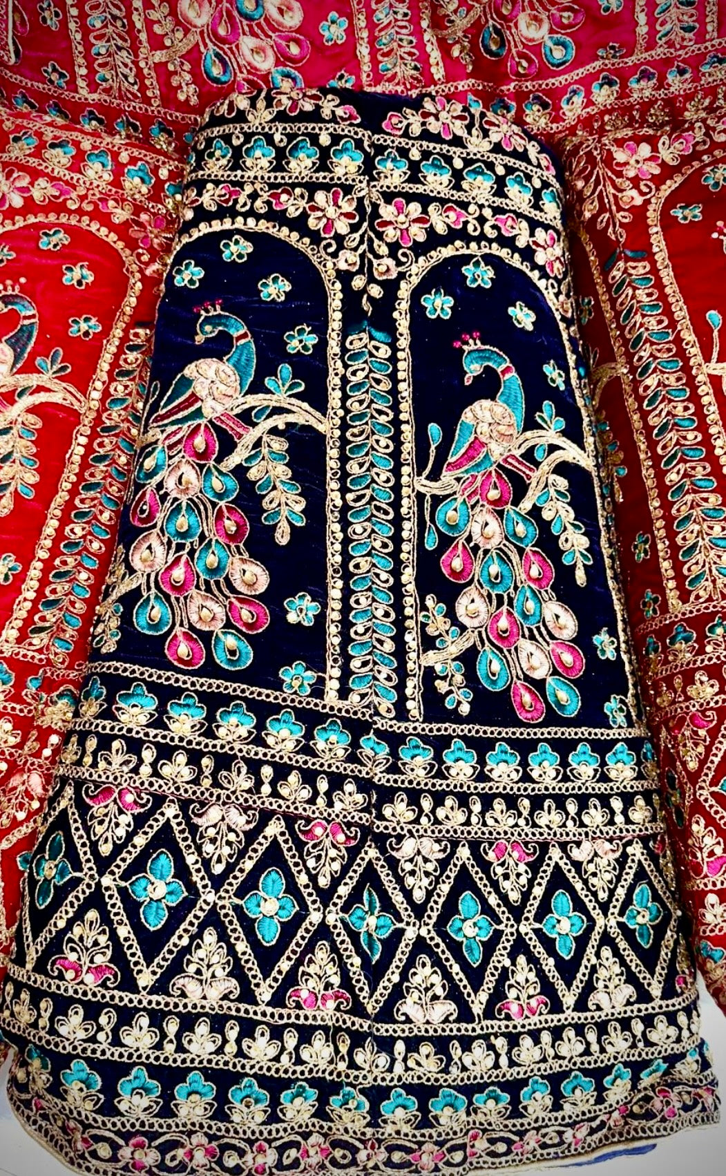 Royal Fuchsia & Red Bridal Lehenga Set with Hand Embroidery and Peacock Motifs Semi - Stitched.