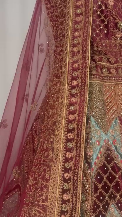 Royal Legacy: Intricately Hand-Embroidered Semi - Stitched Lehenga Set with Velvet Detailing.